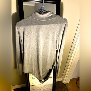 Classy turtle neck solid color bodysuit.